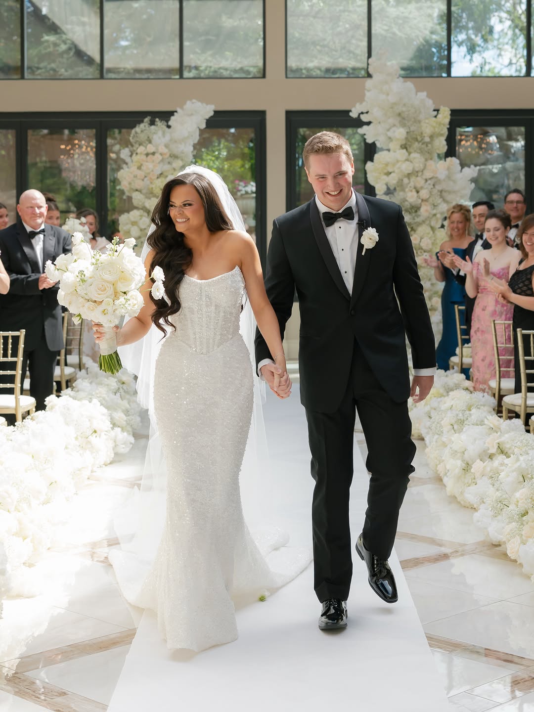 Recessional as bride and groom celebrate